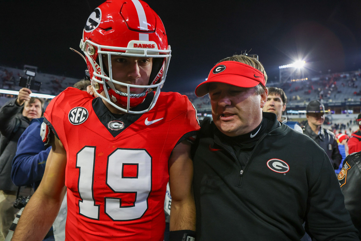 Nov 25, 2023; Atlanta, Georgia, USA; Georgia Bulldogs tight end Brock Bowers (19) and head coach Kirby Smart walk off the field after defeating the Georgia Tech Yellow Jackets at Bobby Dodd Stadium at Hyundai Field. Mandatory Credit: Brett Davis-USA TODAY Sports  